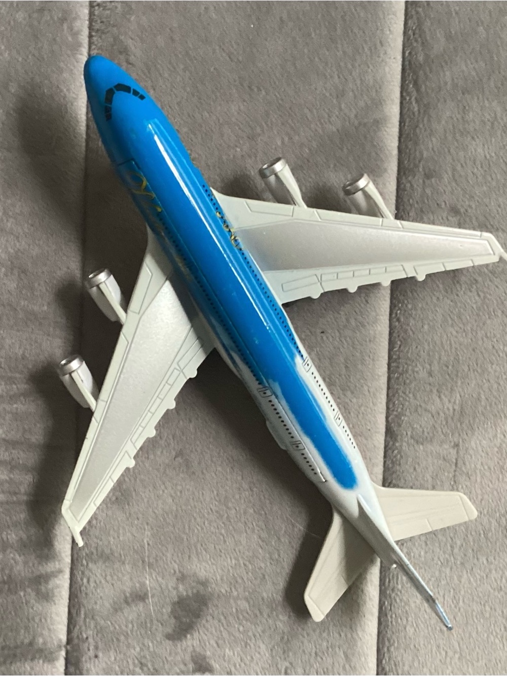 Blue and White Toy Airplane Model